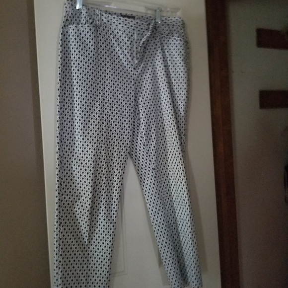 A polka dotted ruffled dress  and pants - Picture 4 of 5